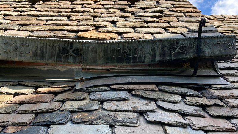 Damaged historic lead gutter and flashing