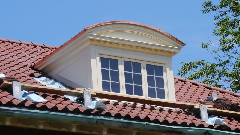 Lakewood copper barrel roof dormer front side